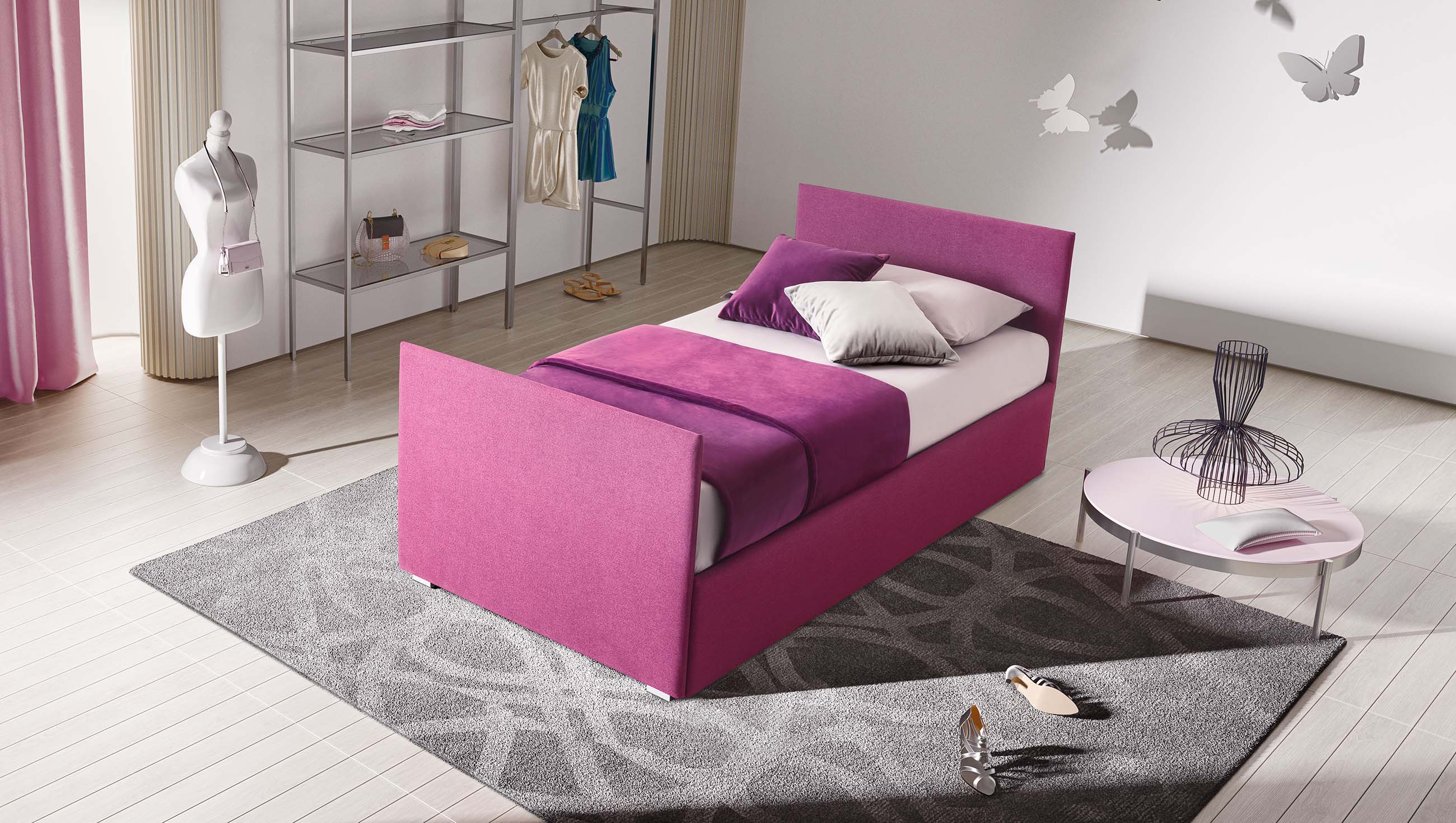Upholstered single bed with fuchsia fabric-covered frame. Very thin headboard and footboard