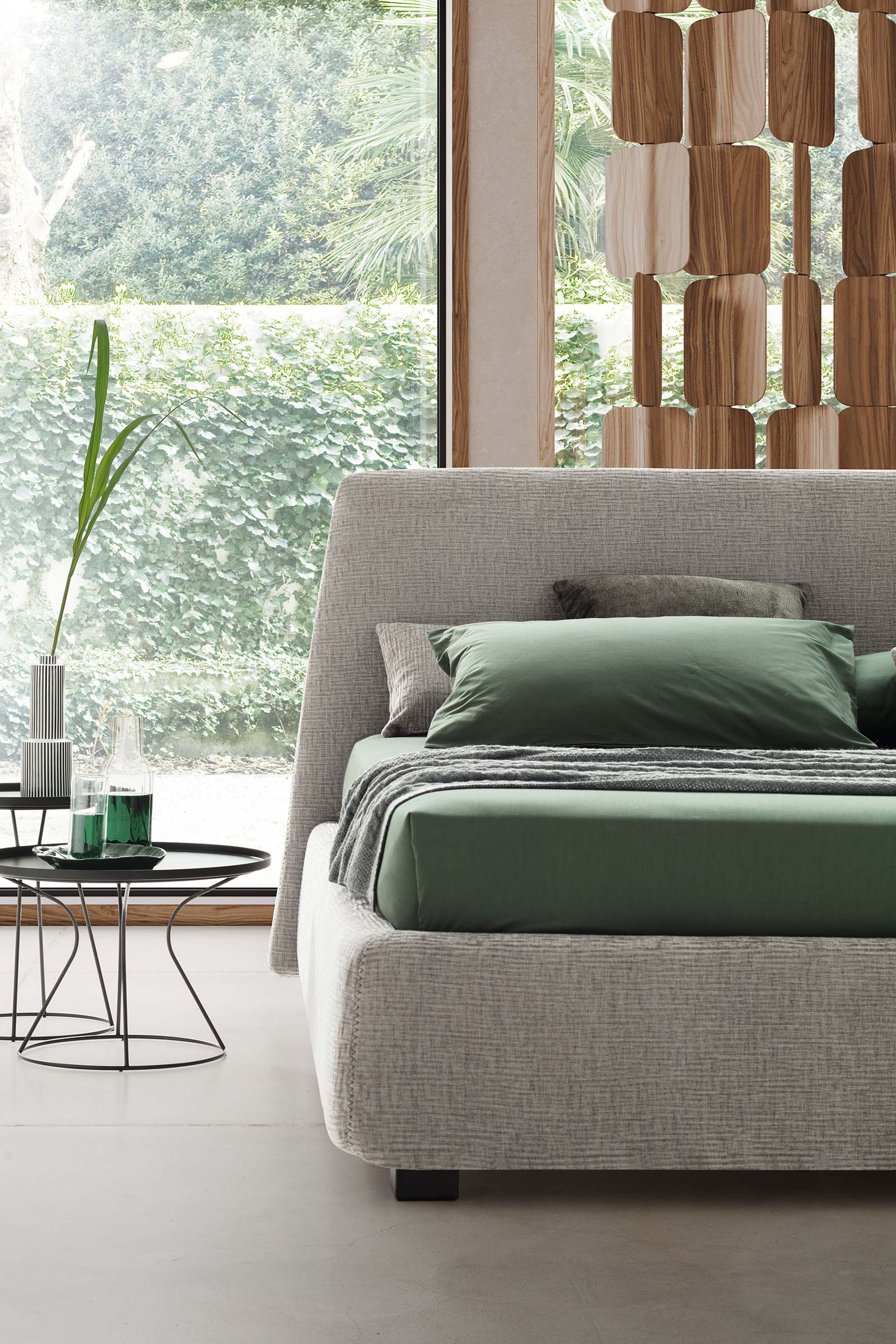 Modern and simple bed with low feet and wide bed frame