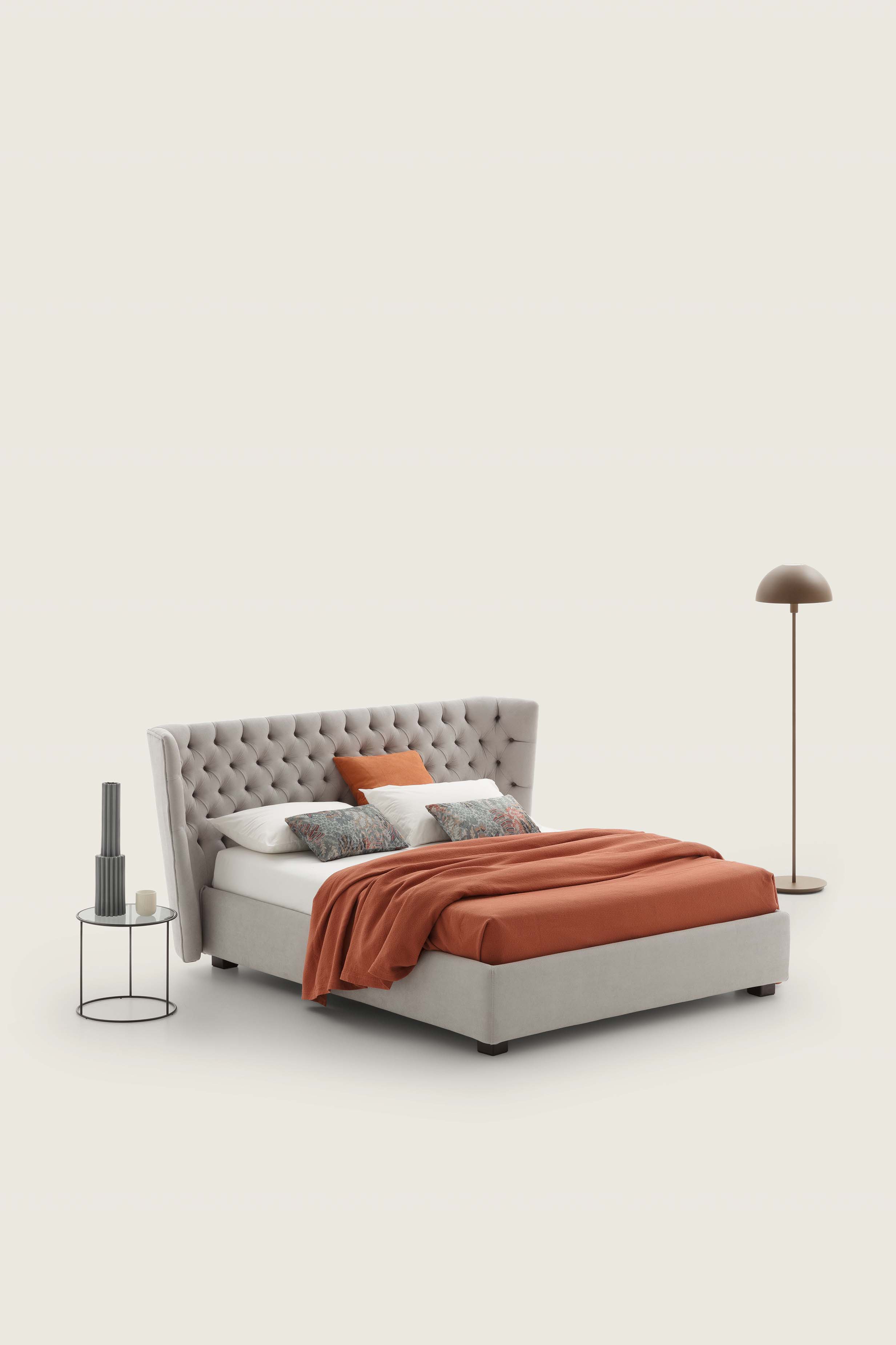Classic Chesterfield-style bed in gray-cream fabric