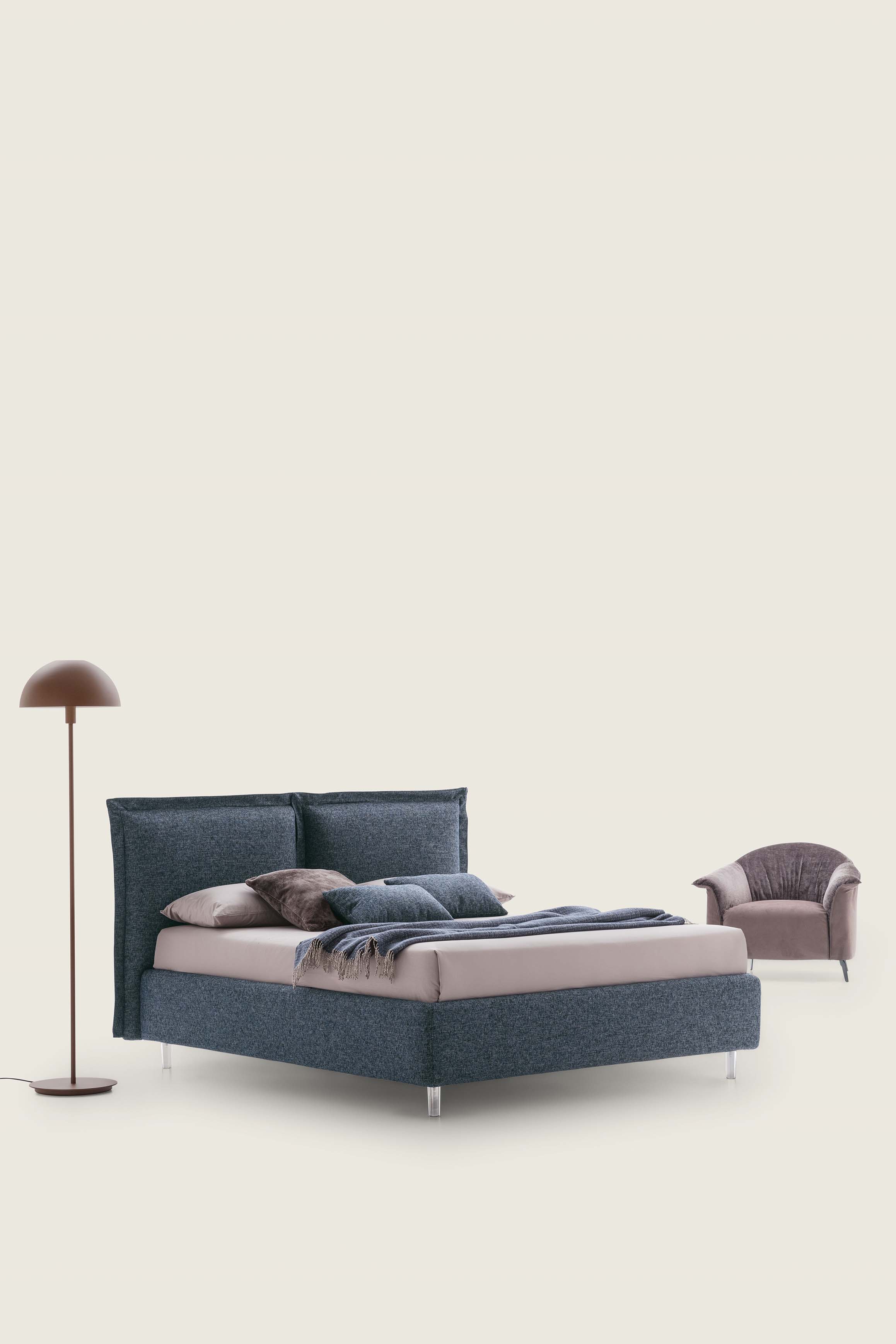 Simple upholstered double bed with midnight blue upholstery