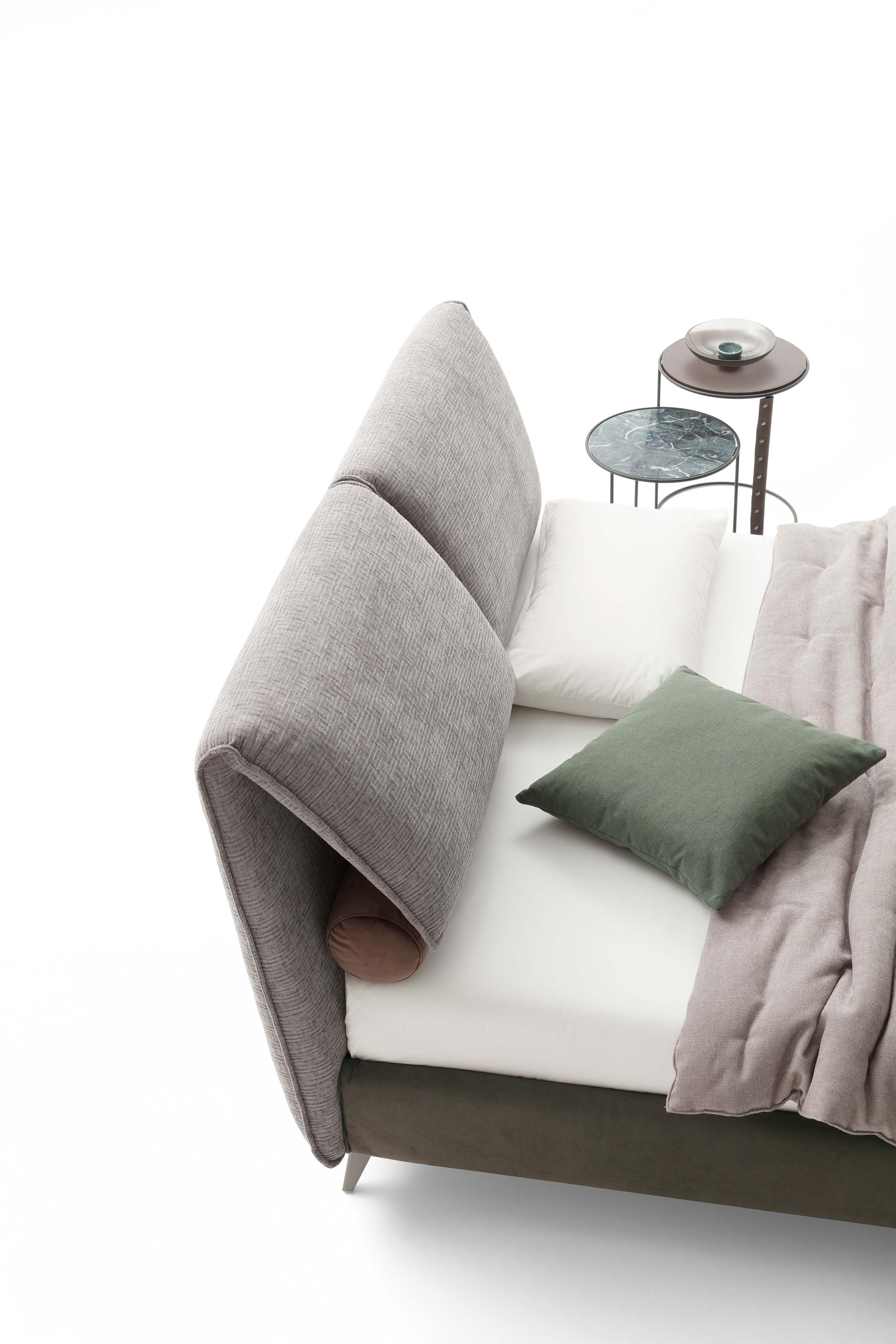 Detail of the adjustable headboard of a designer double bed