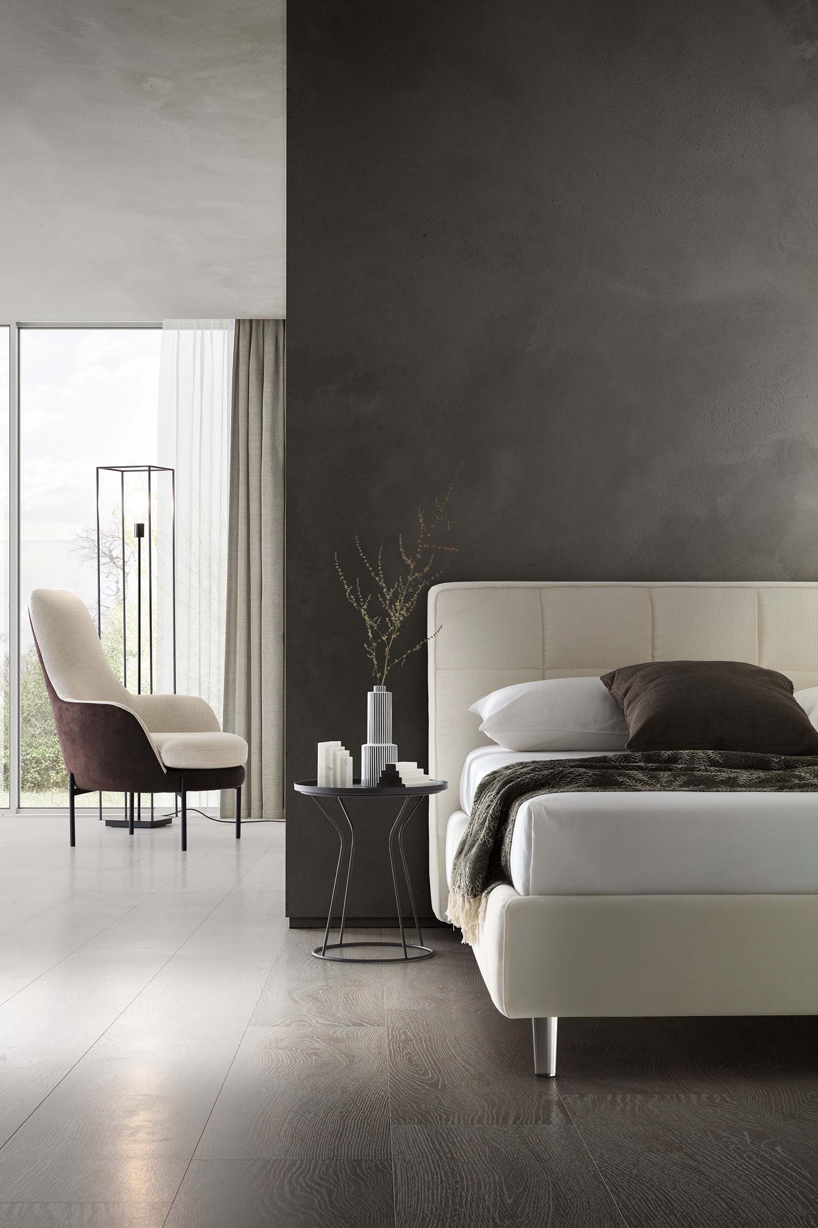 Modern bedroom furnished with a white bed with high transparent plexiglass feet and square backrest