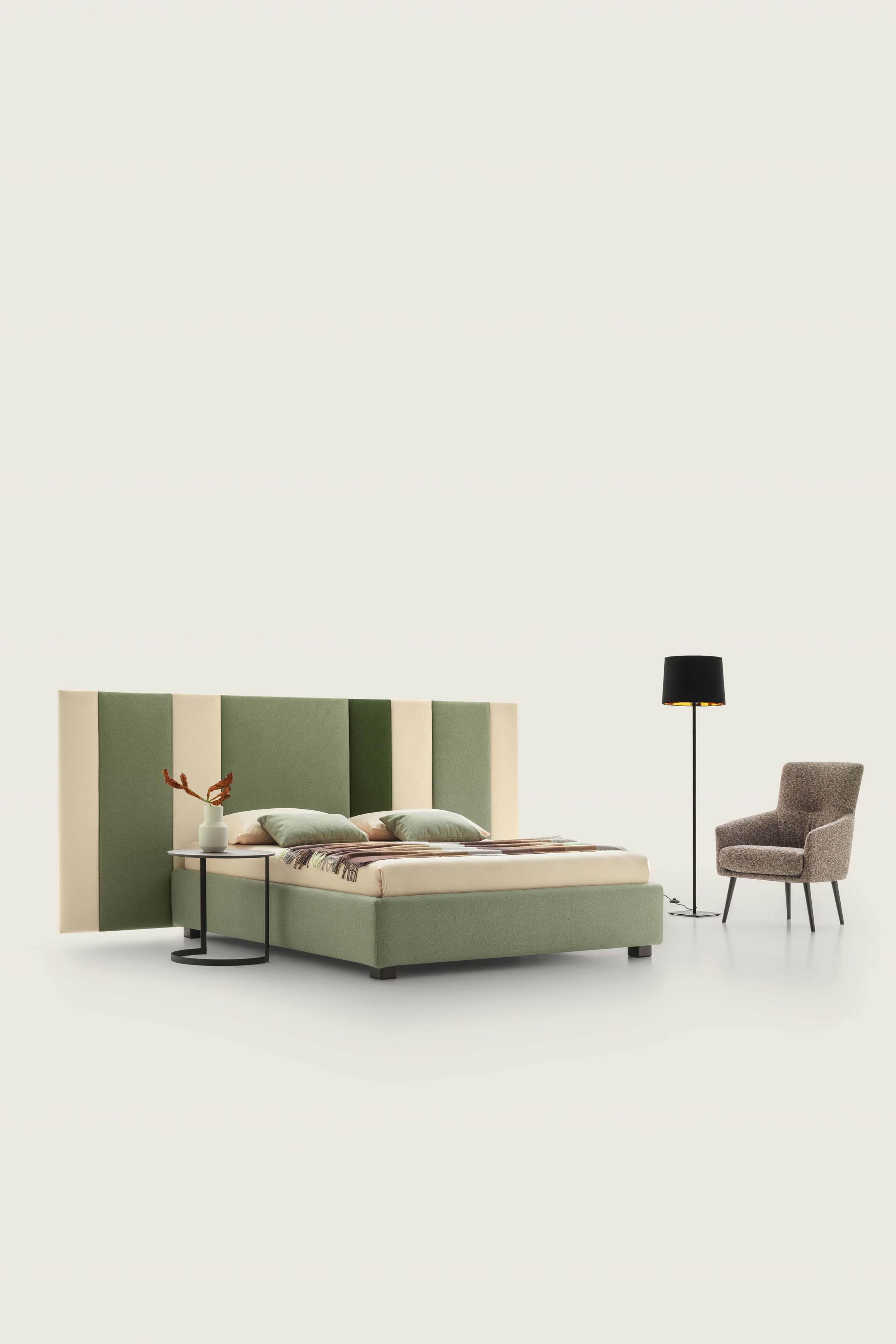 Wide wall headboard in light green, cream and dark green colors for a contract bed