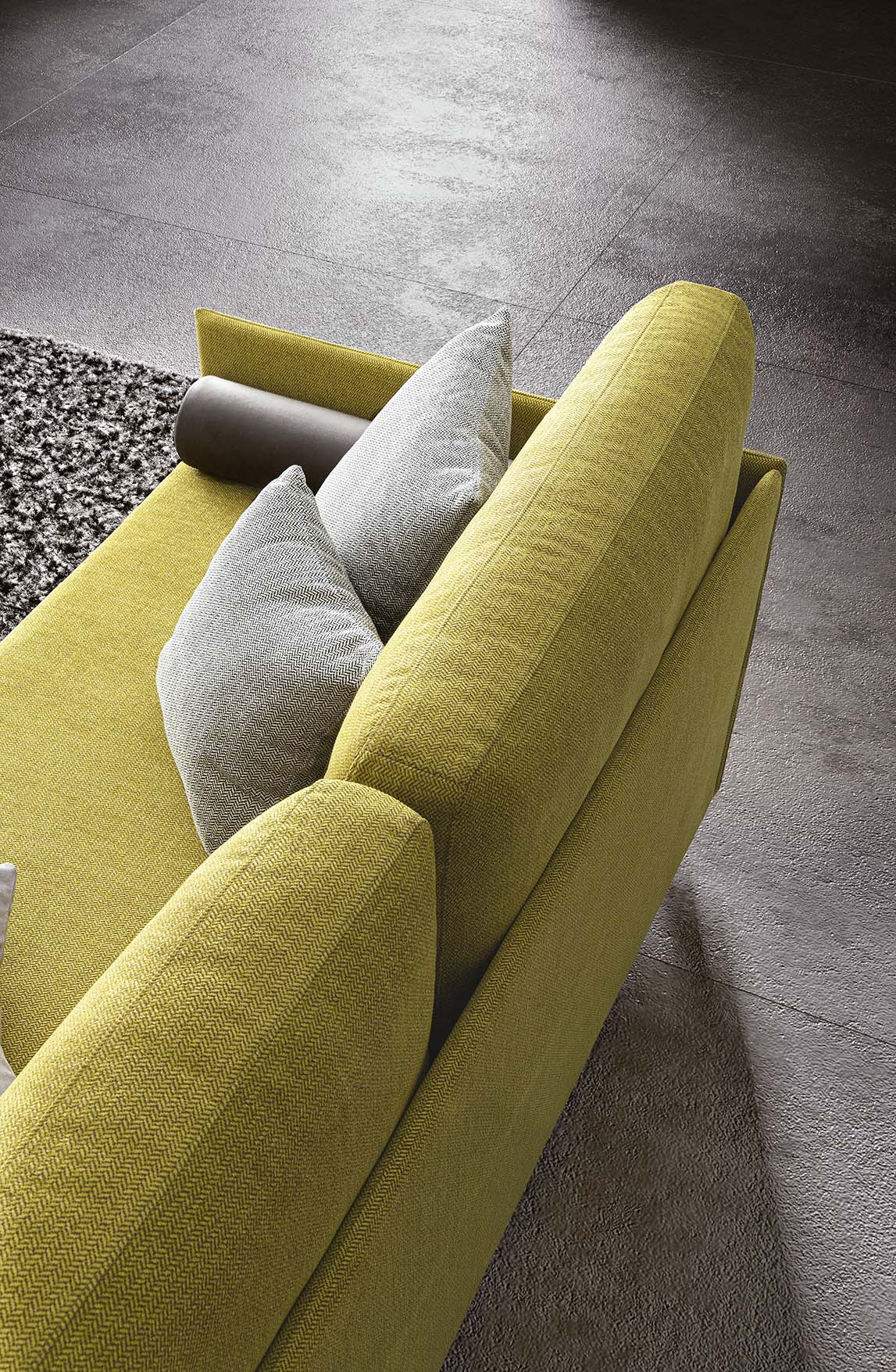 Detail of the thin backrest and minimal footprint armrests