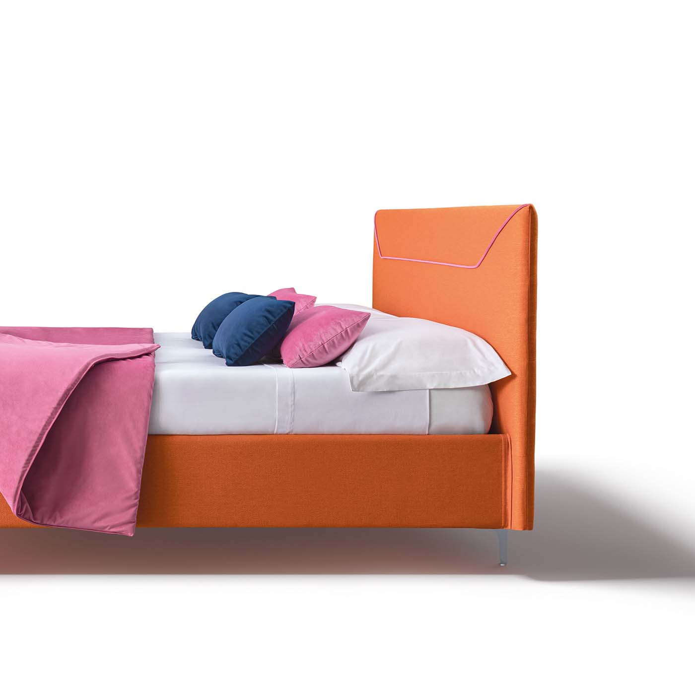 Side view of the Mirabilis bed with fuchsia edging that stands out on an orange fabric