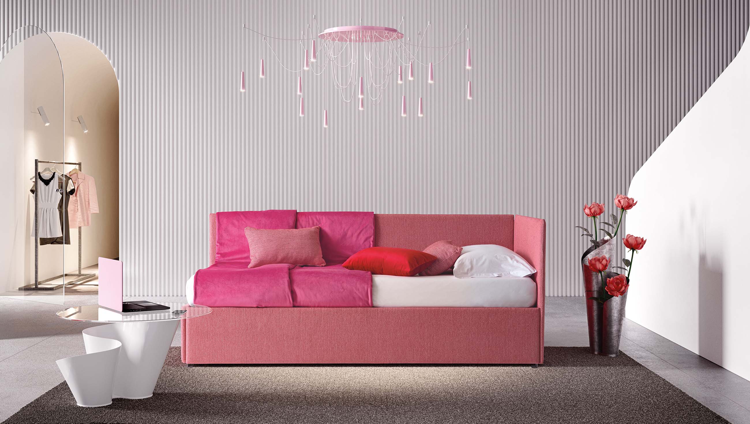 Single daybed with headboard and armrest that create an angular wall to the sofa to contain rest