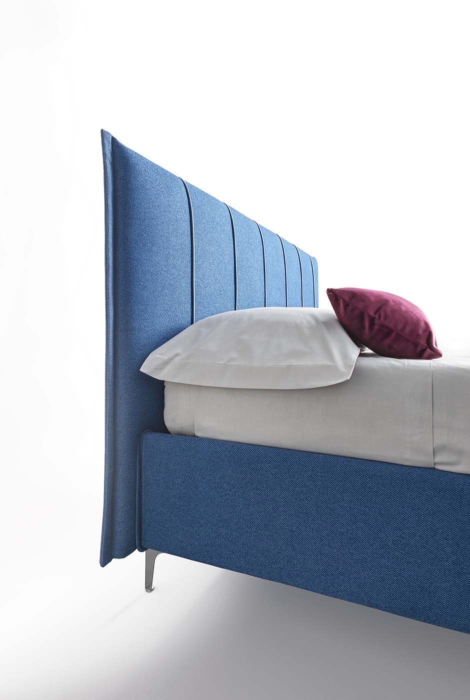 Decorative detail of the headboard with vertical piping
