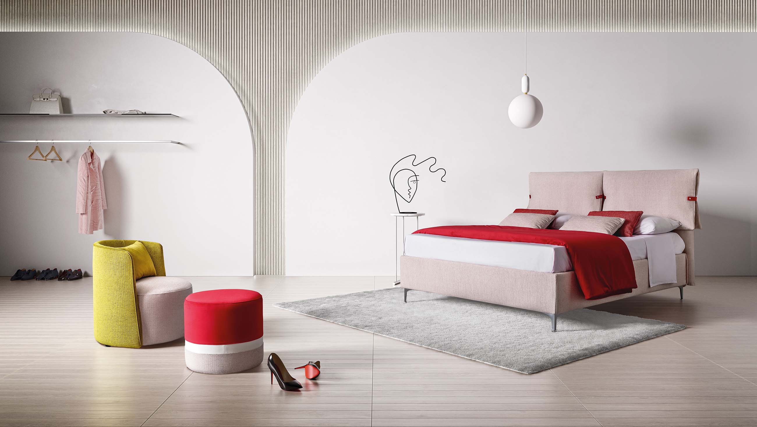 Space-saving bed with headboard composed of large powder-pink cushions fixed with red details