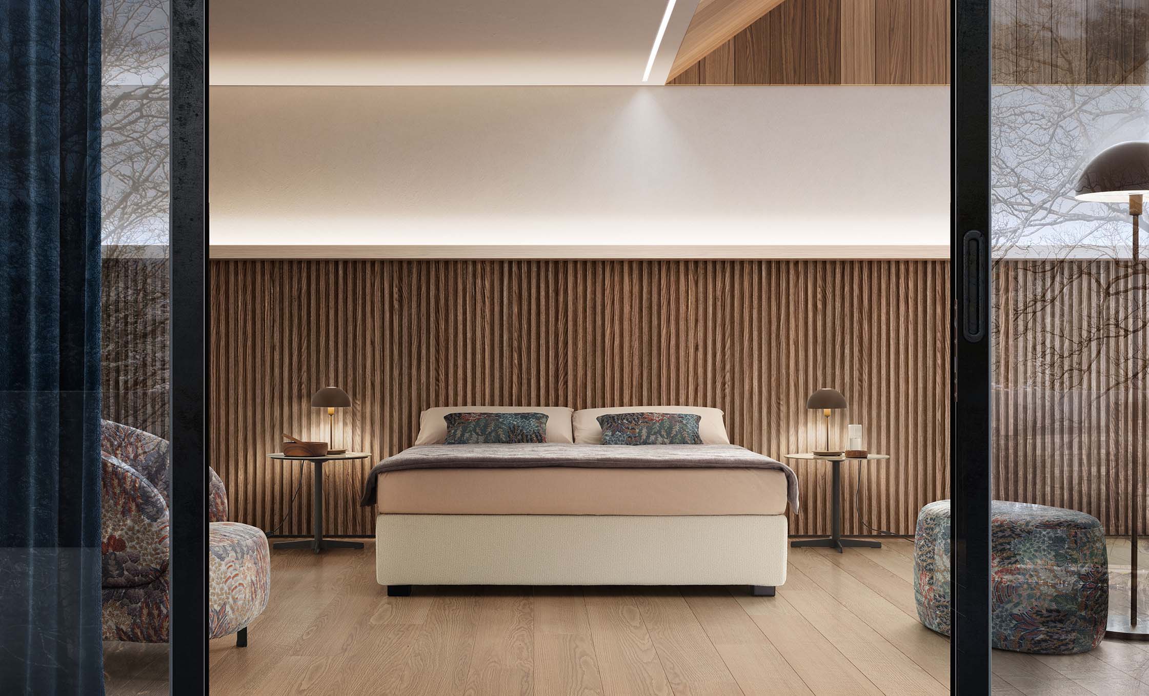 Classic room furnished in warm-toned wood with a bed without headboard
