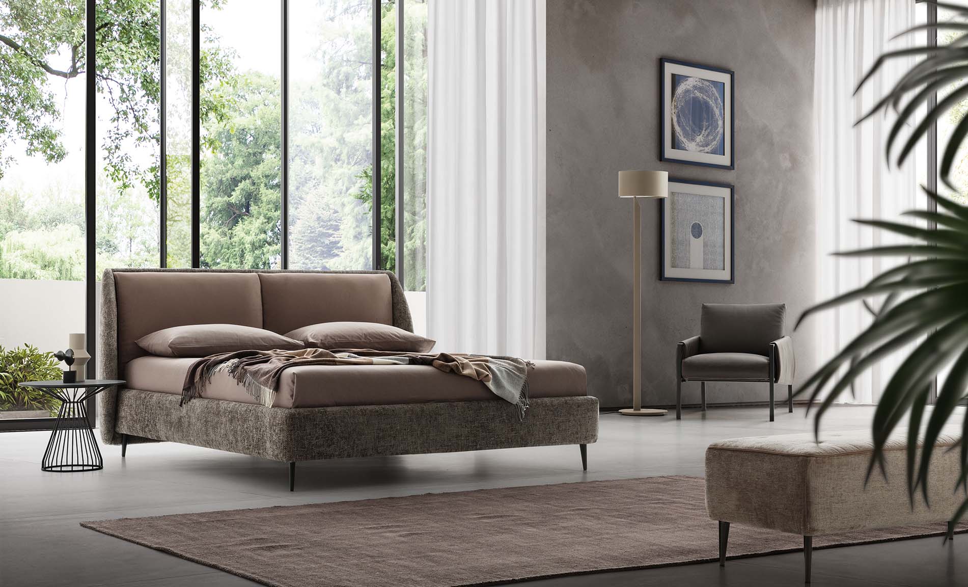 Modern room furnished with a modern wingback bed with cushions