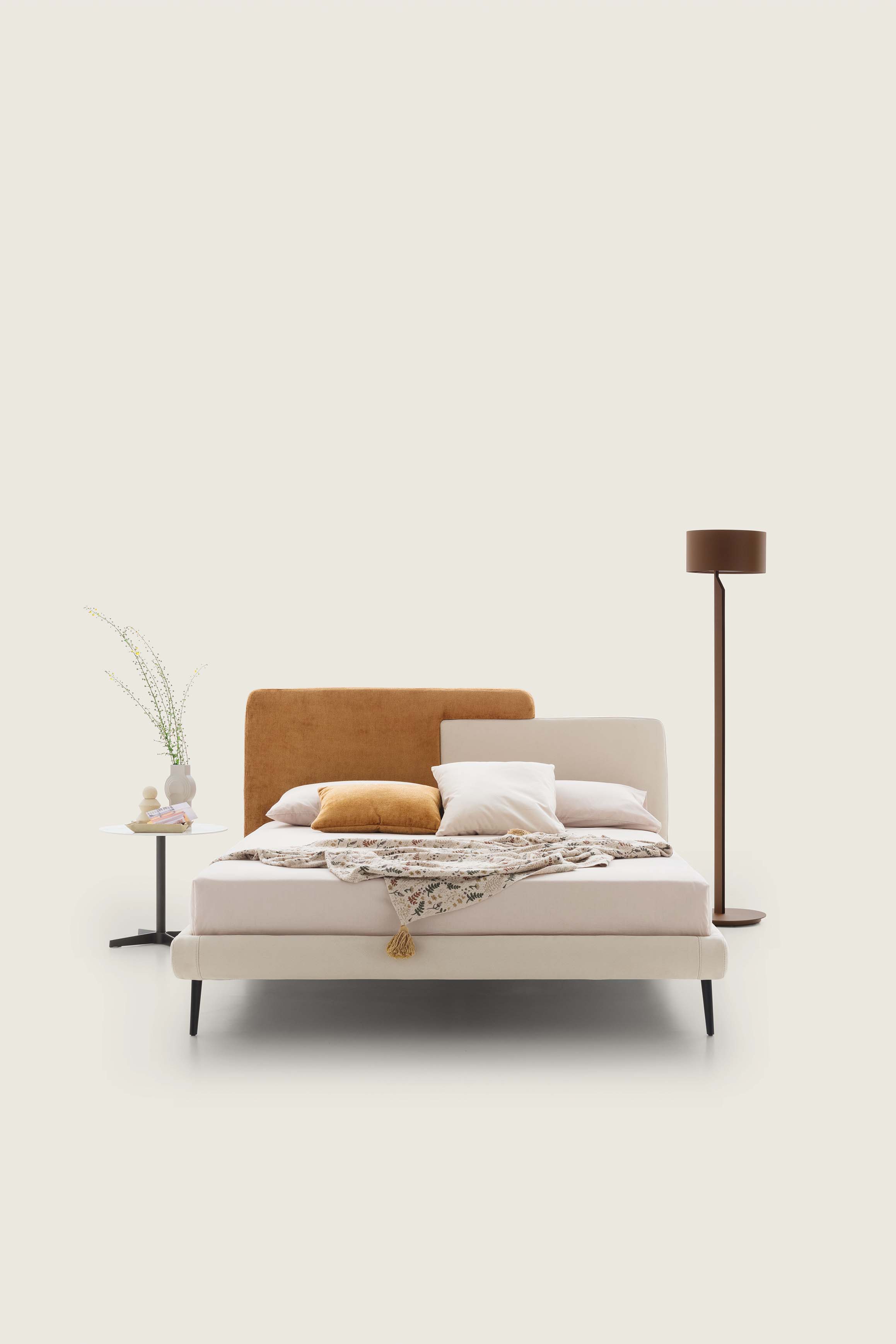 Upholstered double bed with an eccentric style, with corten and white colored upholstery