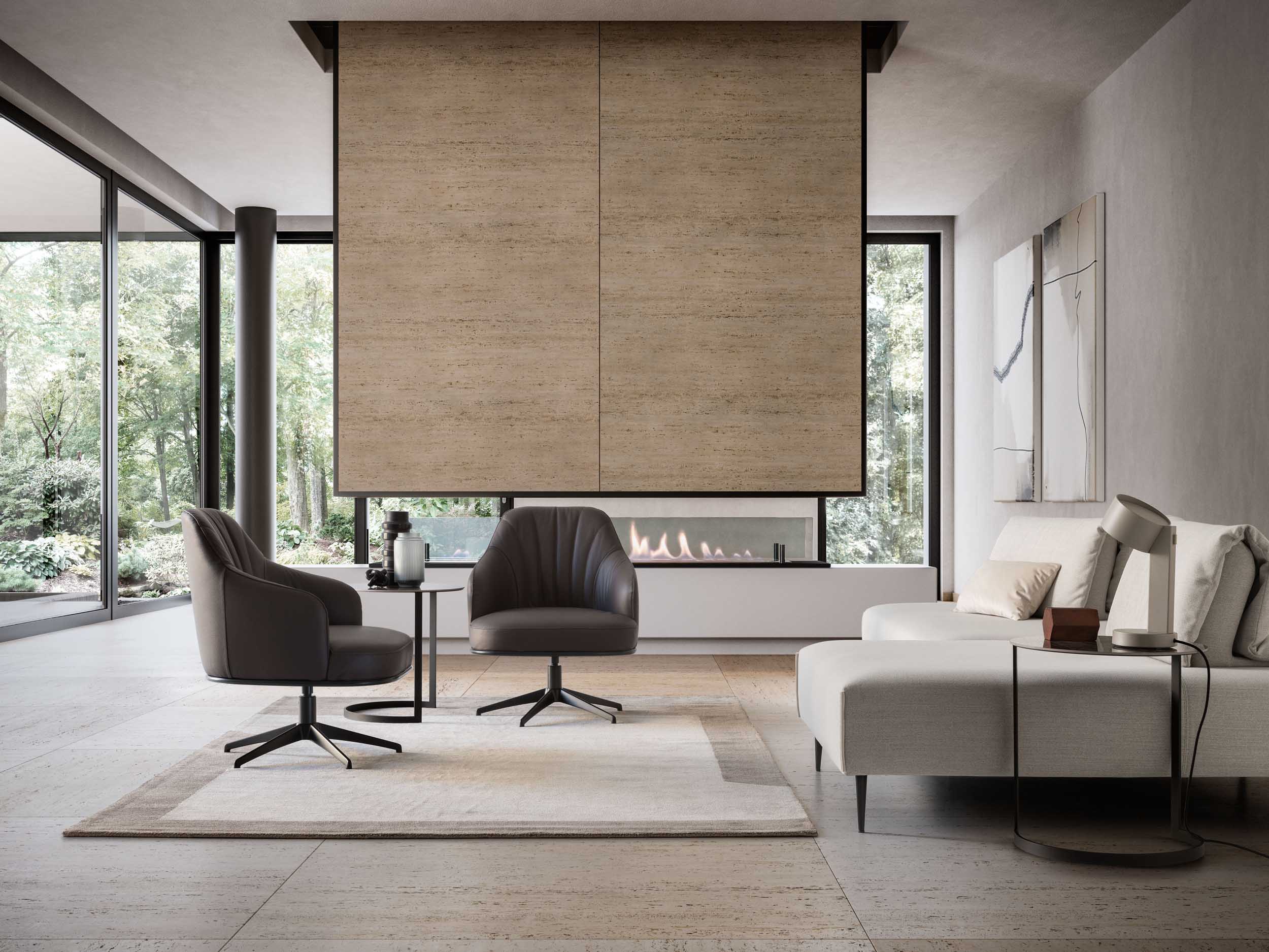 Modern lounge with black swivel armchairs on a large geometric rug
