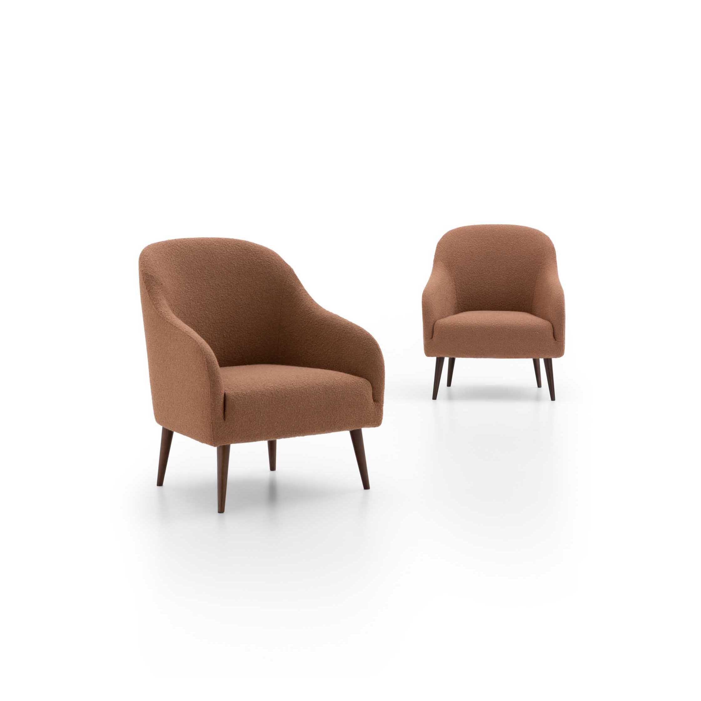 Brick-colored armchair with a rounded backrest