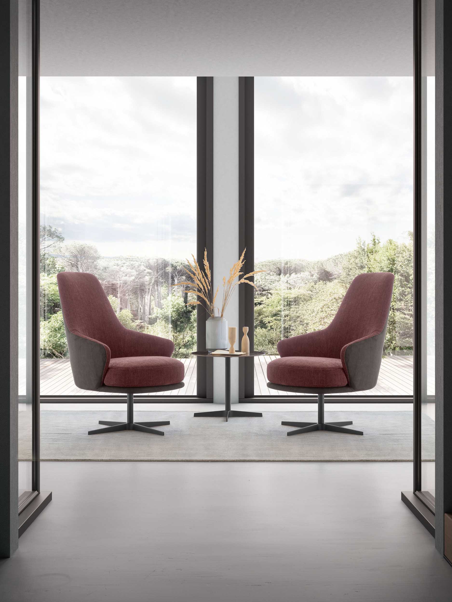 Bicolor swivel armchair in burgundy and dark gray in a modern setting