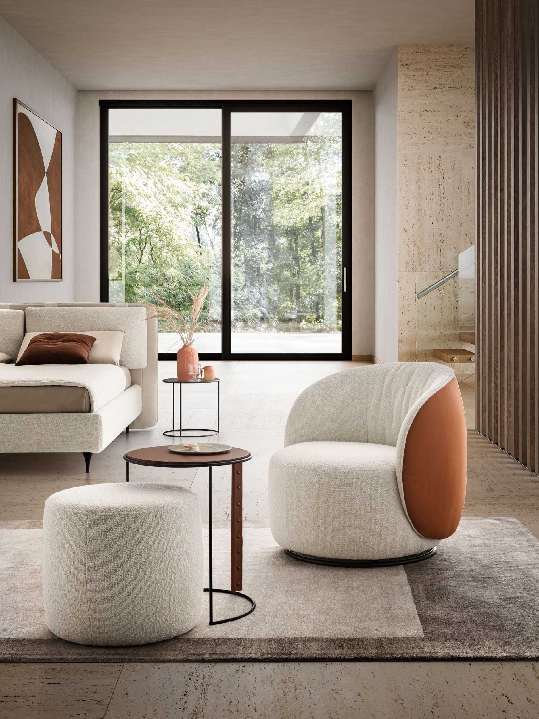 White round armchair with orange sides in a modern bedroom