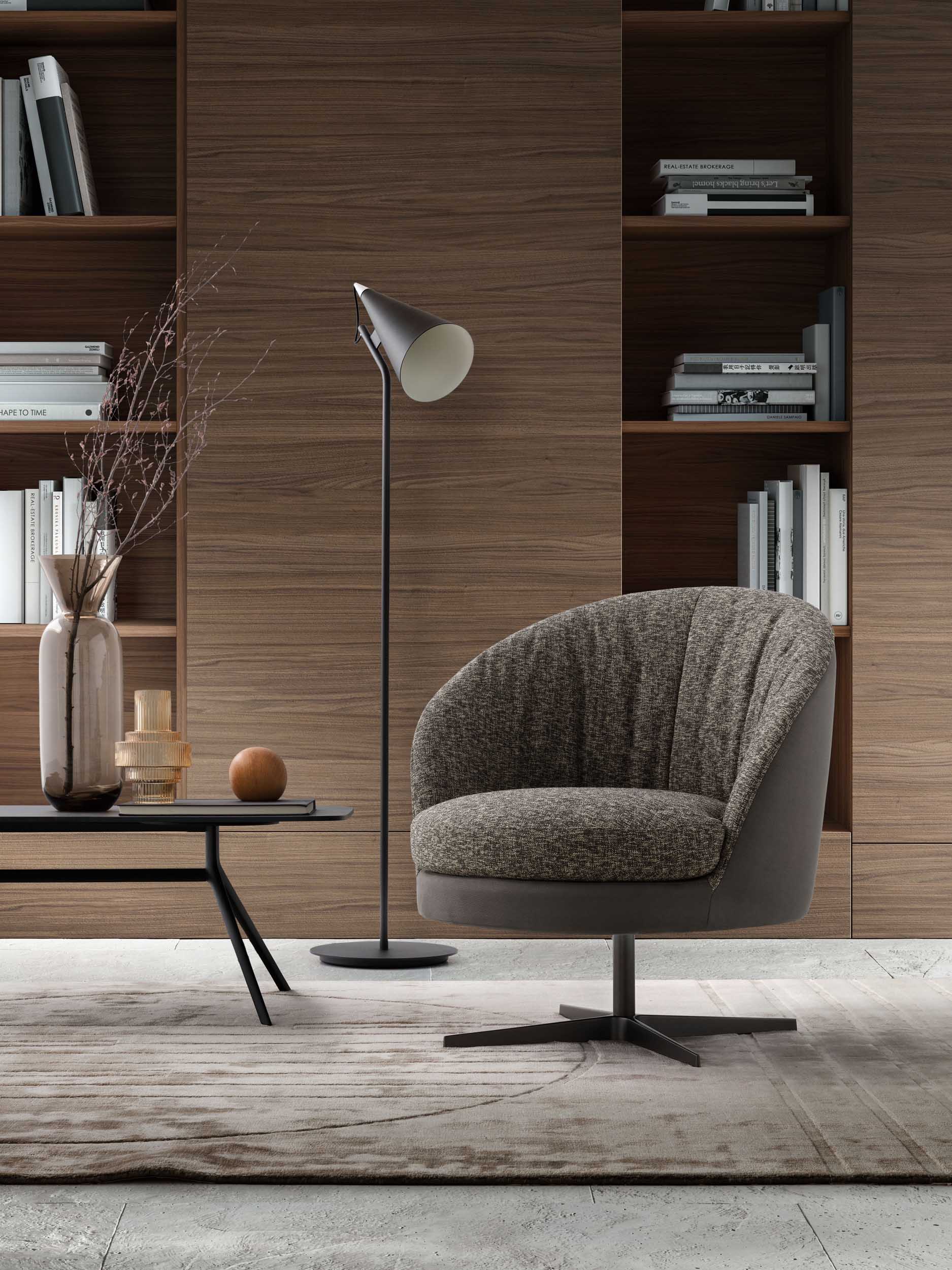 Swivel gray armchair placed in a home studio.