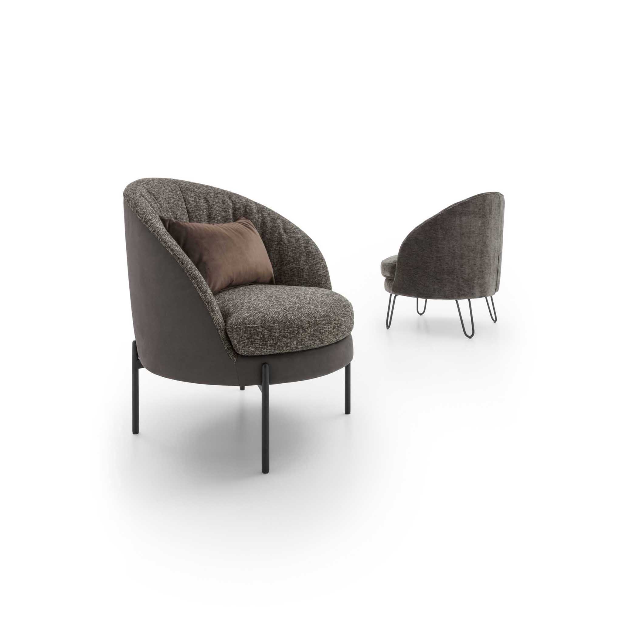 Fixed-frame version of the Oyster armchair with different designer legs.