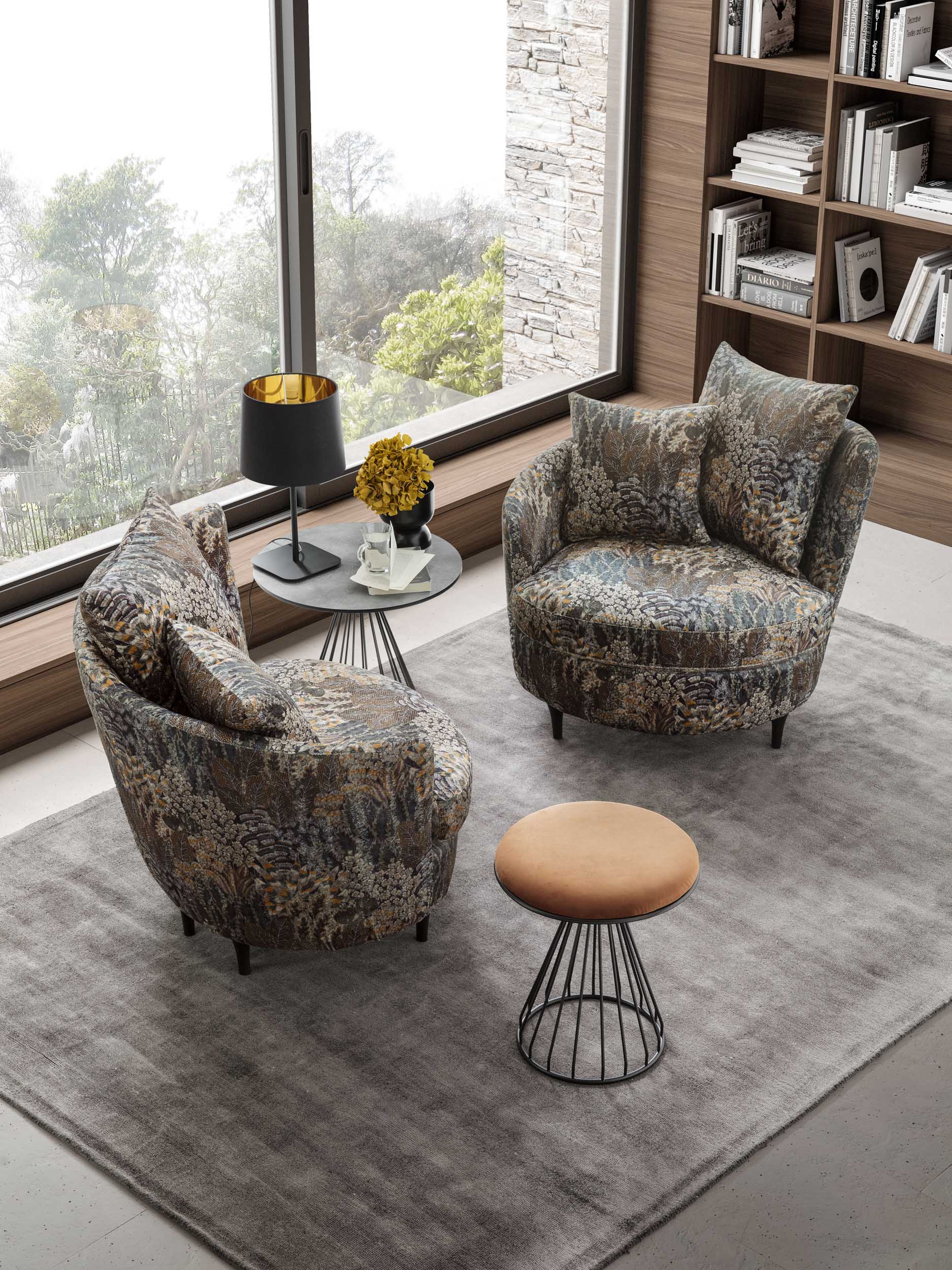 Lounge set with two armchairs in a modern floral pattern.