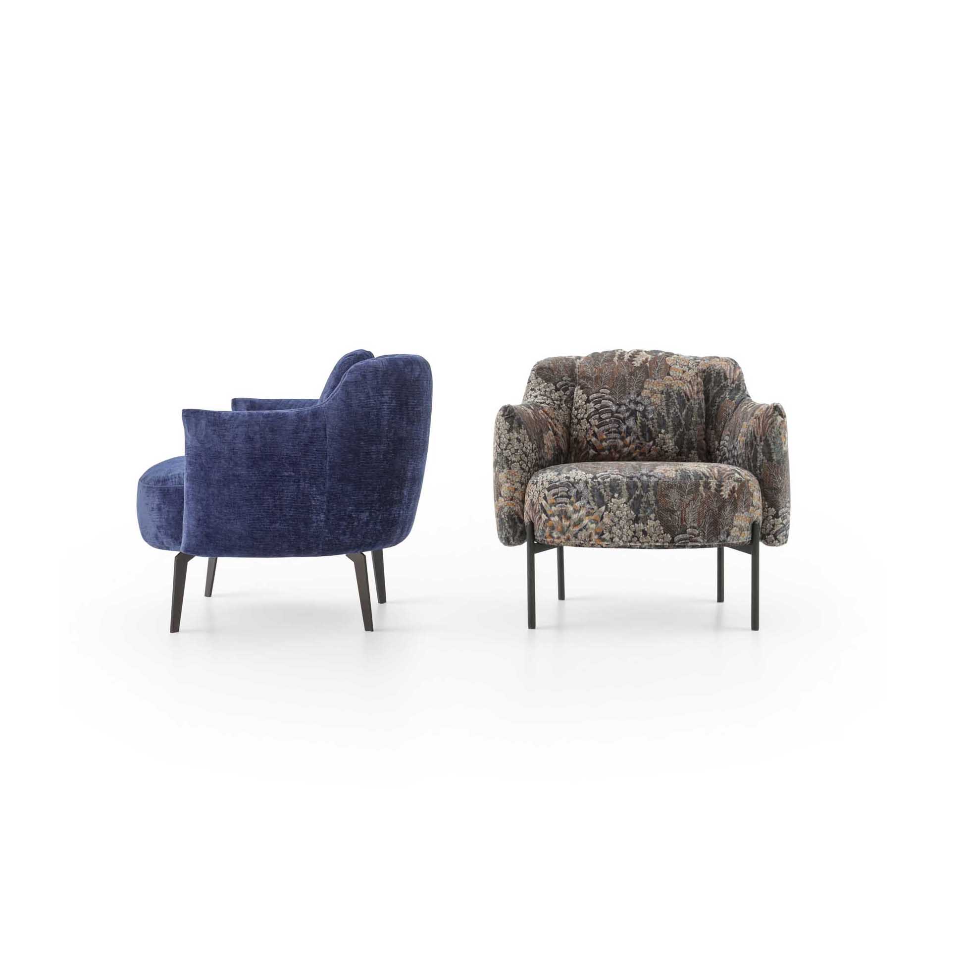 Modern armchairs with monochrome and multicolored upholstery.