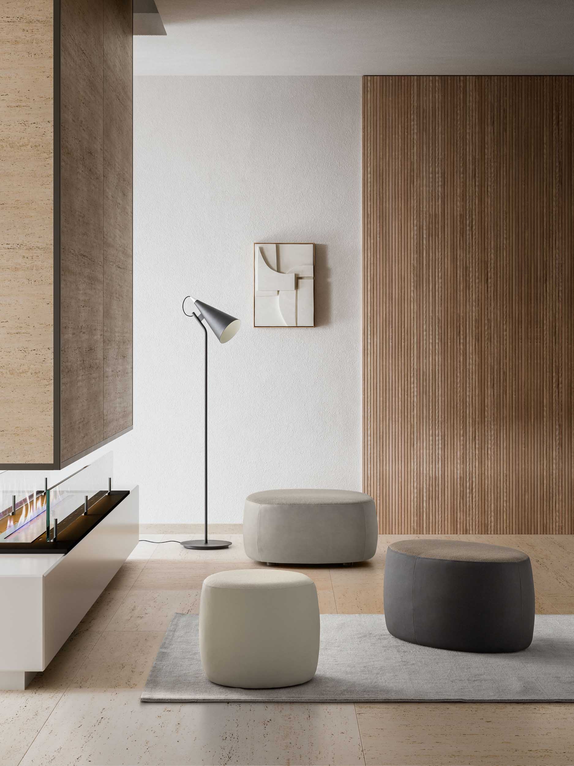 Modern living room furnished with different types of poufs