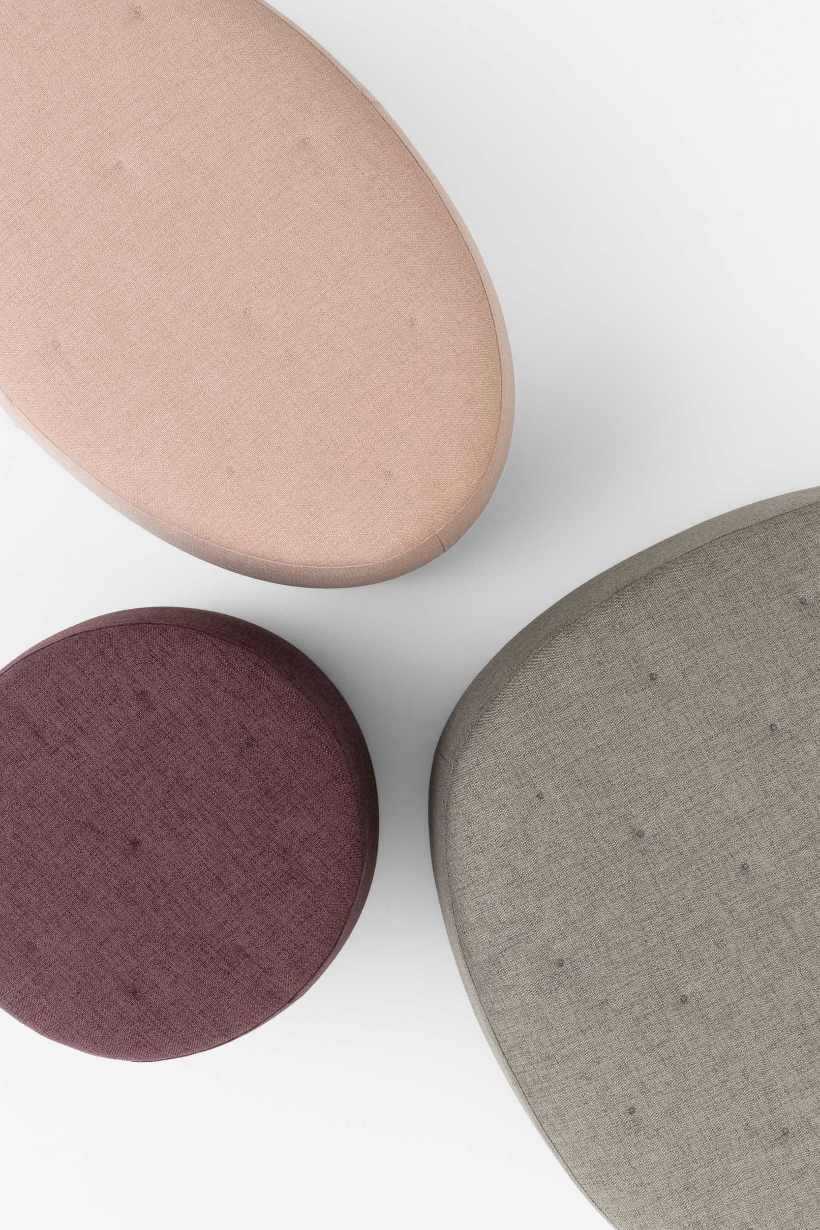 Detail of poufs with quilted surfaces