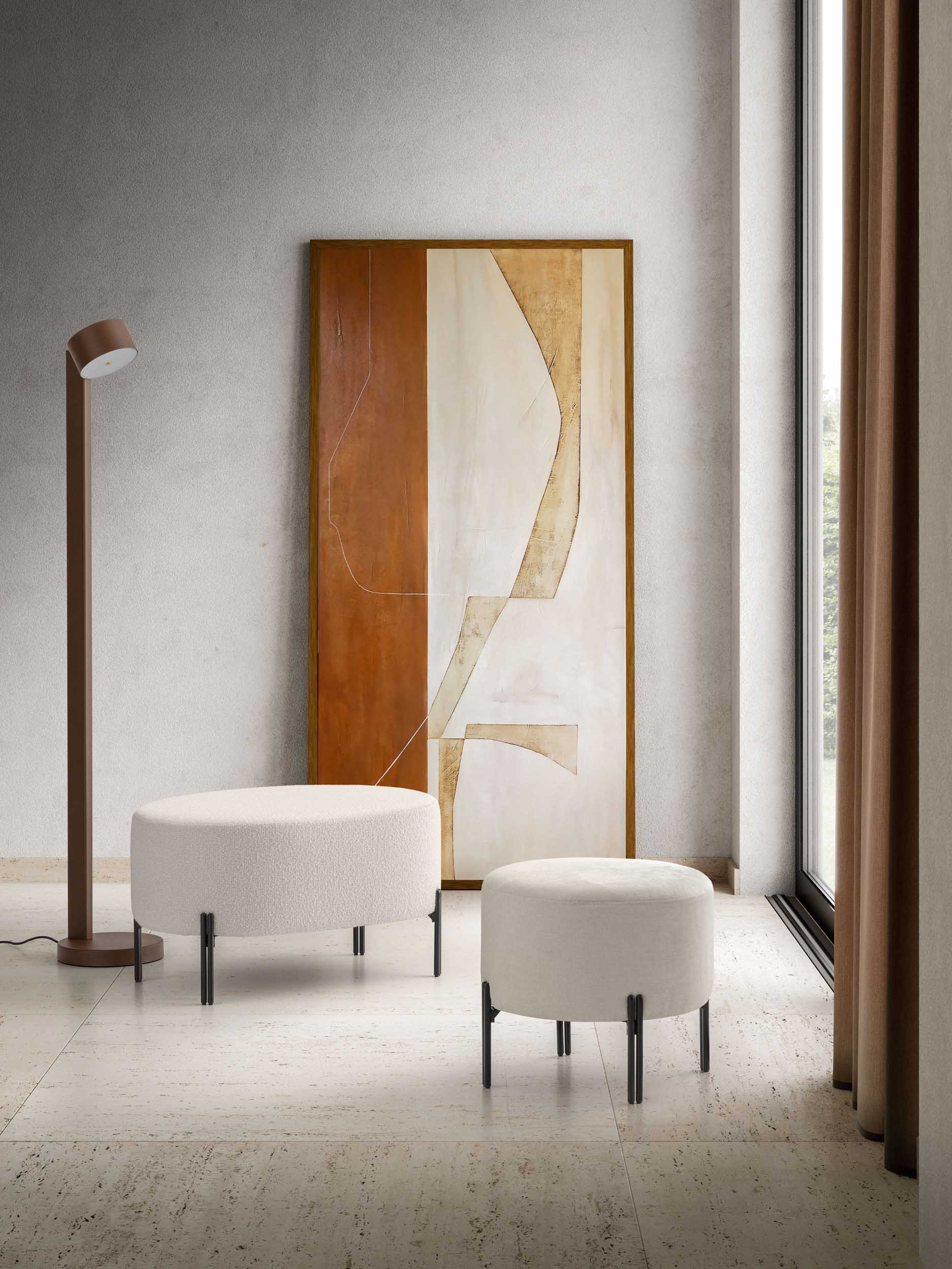 White Timis and Nanà poufs with a sleek design in a modern corner