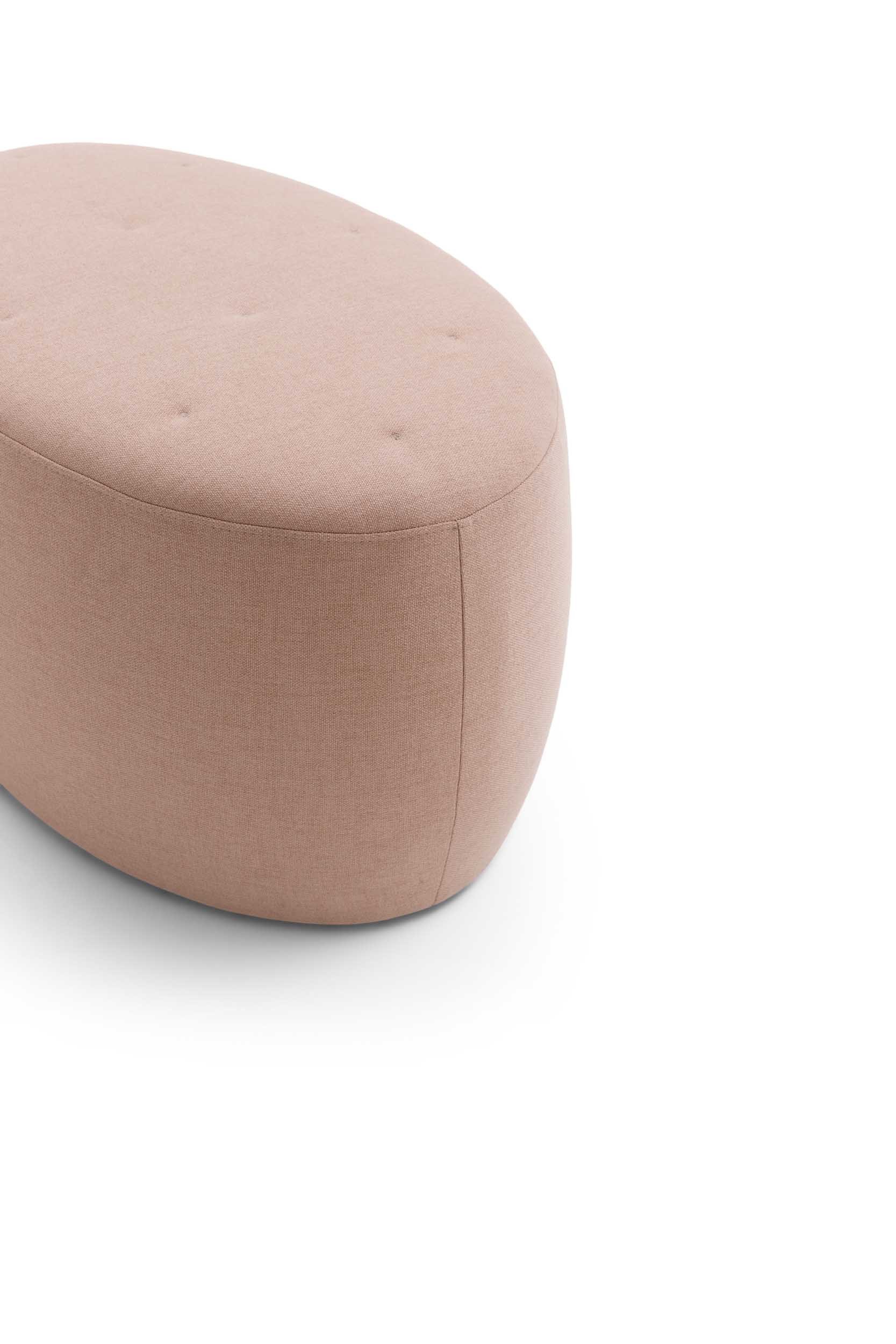 Close-up of the quilted upholstery of the Wilson pouf