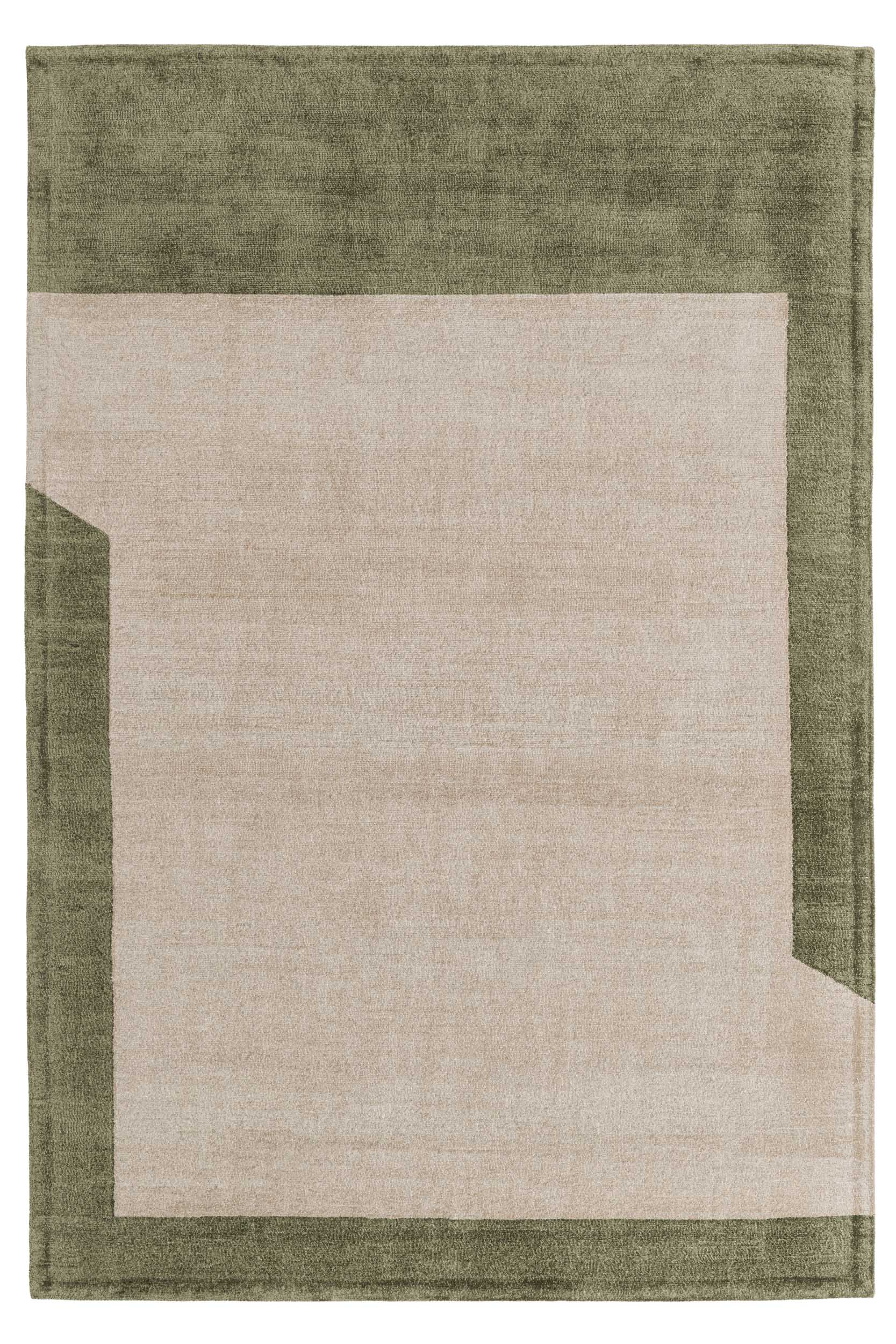 Large rug with a green geometric design