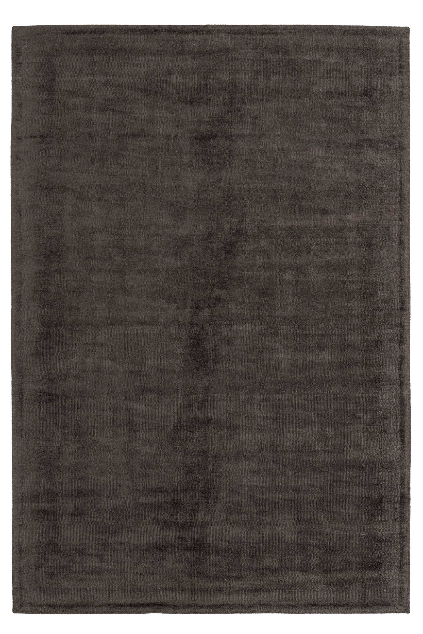 Spacious rug in dark brown color