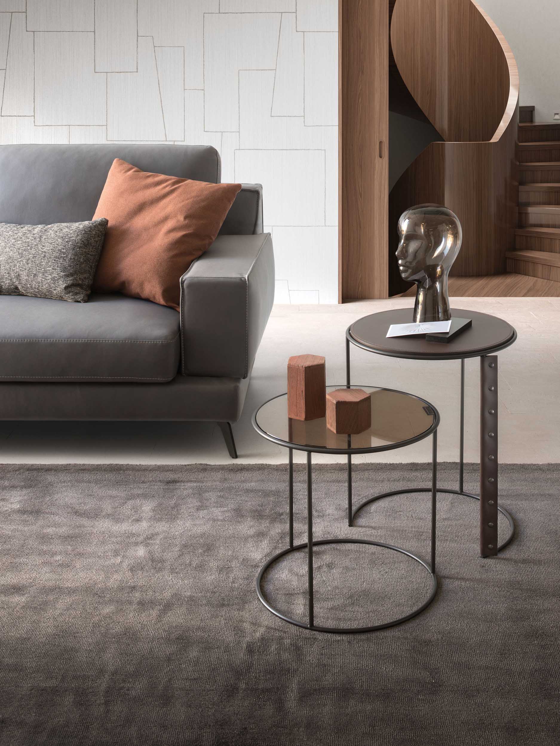 Jarvis nesting tables with glass tops in a modern living room