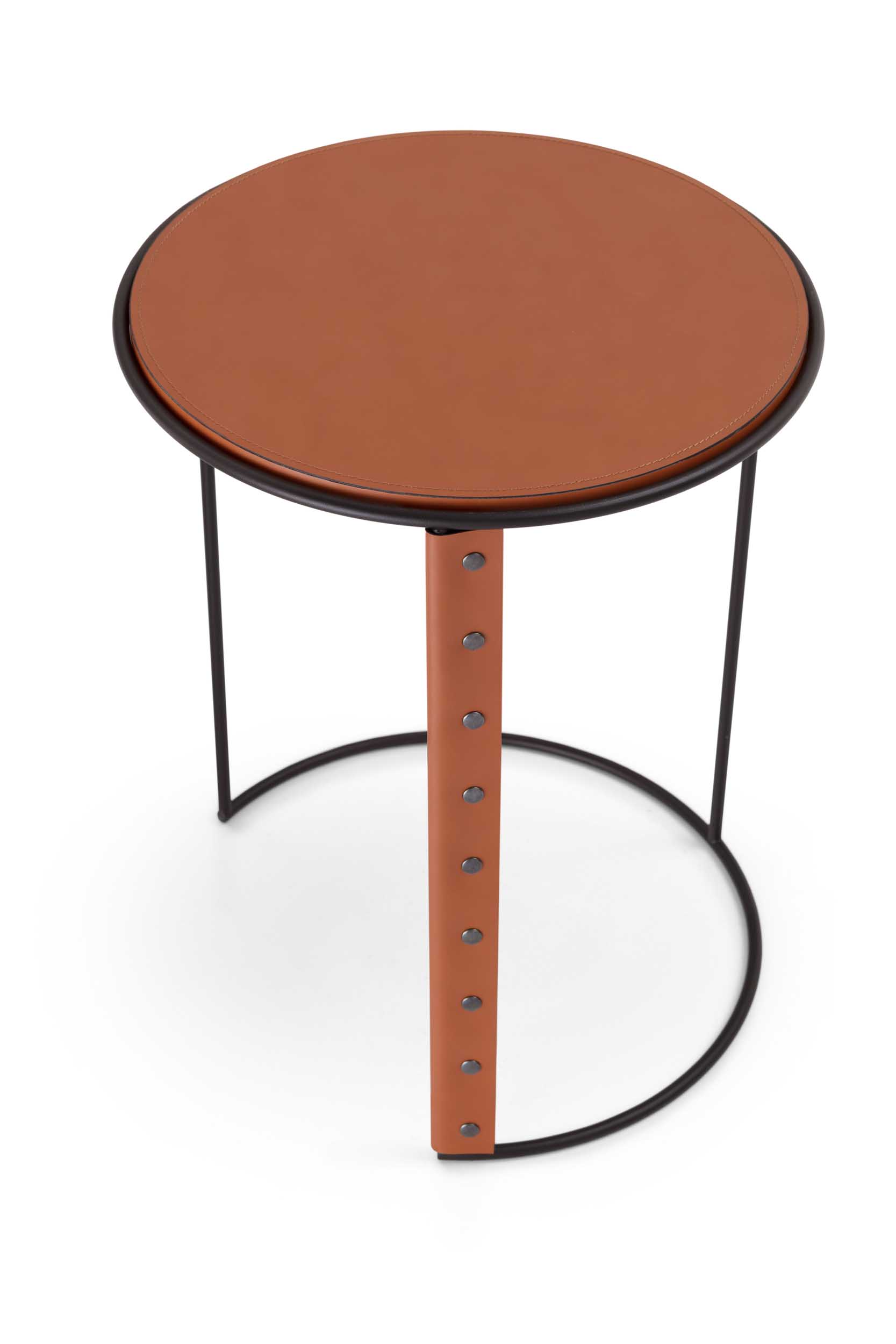 Round table with a semi-circular base and a leather top.