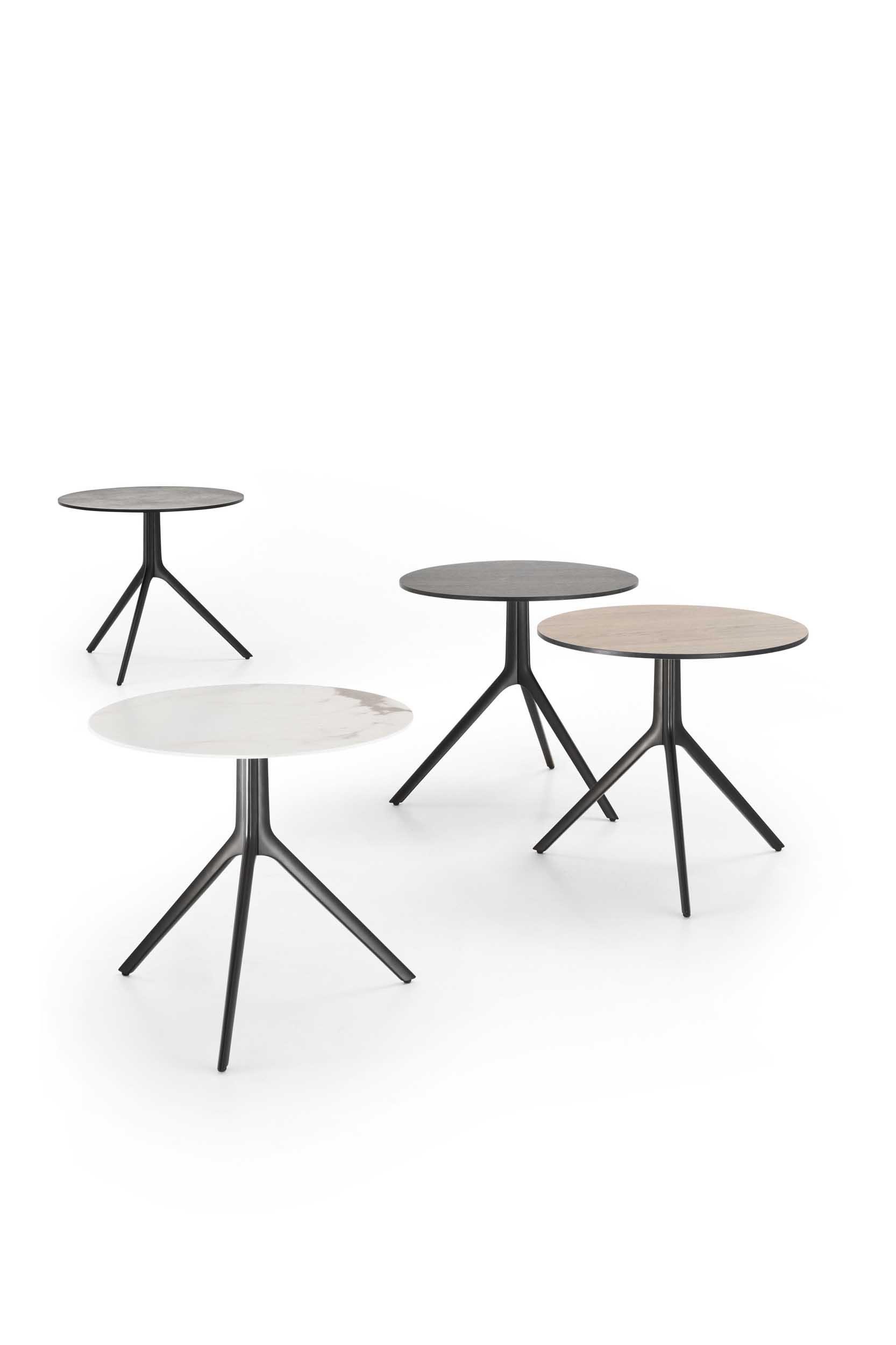 Various versions of modern tables with tops in different colors