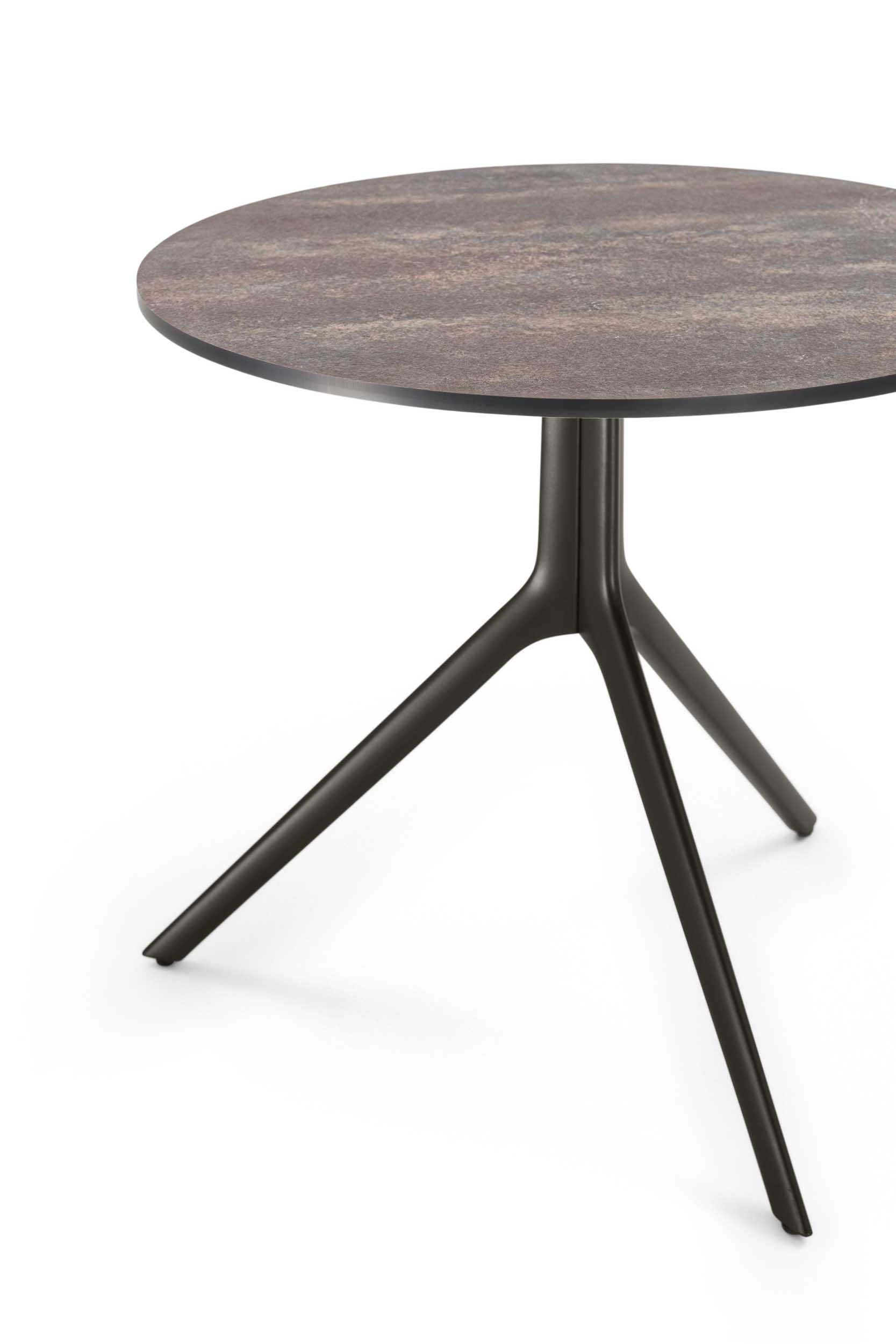 Modern table with an Oxun stone top and dark structure.