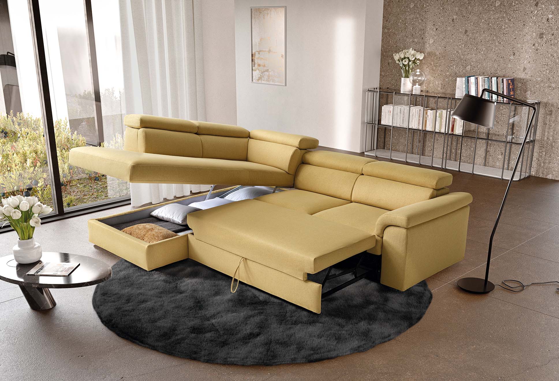 Sofa with large storage chaise longue and adjustable headrests. Pull-out mechanism platform for comfortable resting