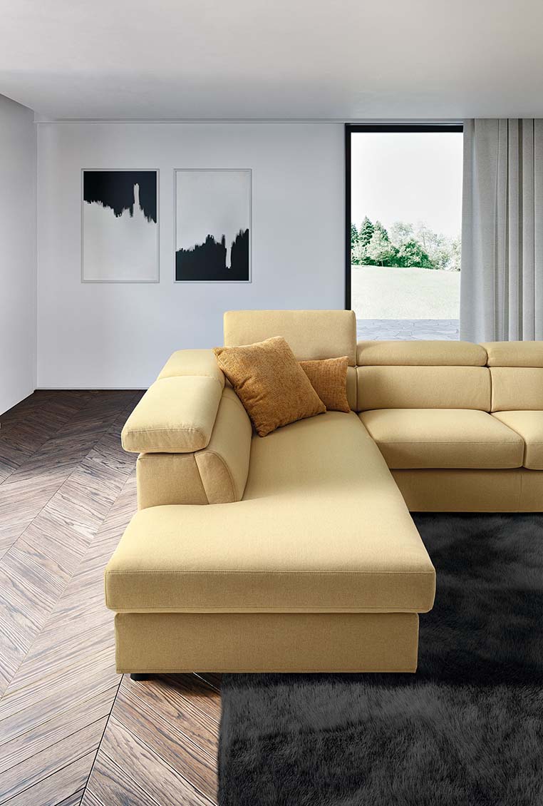 Detail of the chaise longue of a sofa with adjustable headrests