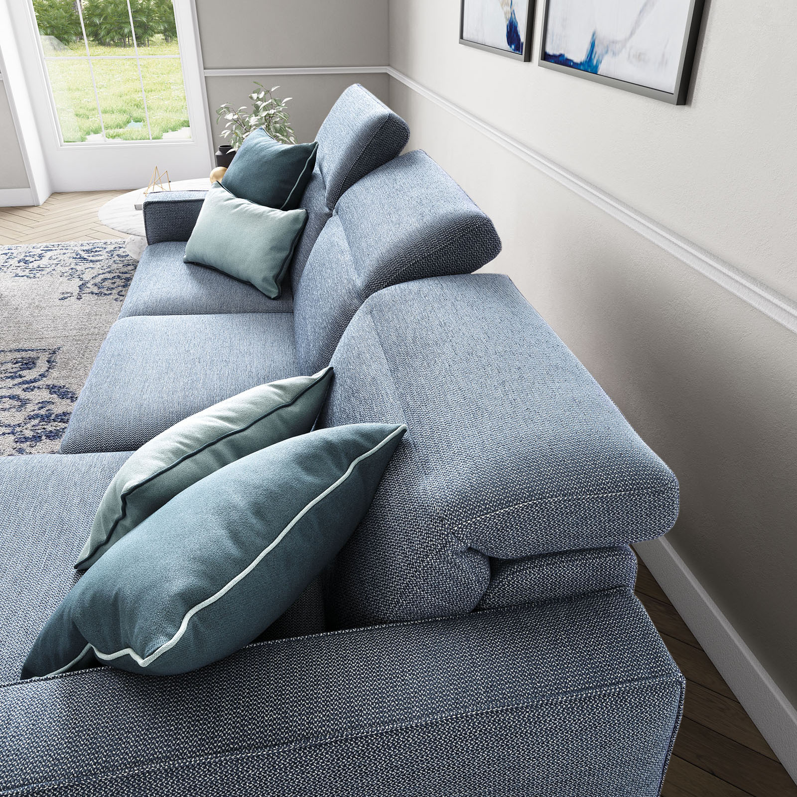 Fabric sofa with a reclining mechanism and adjustable headrests